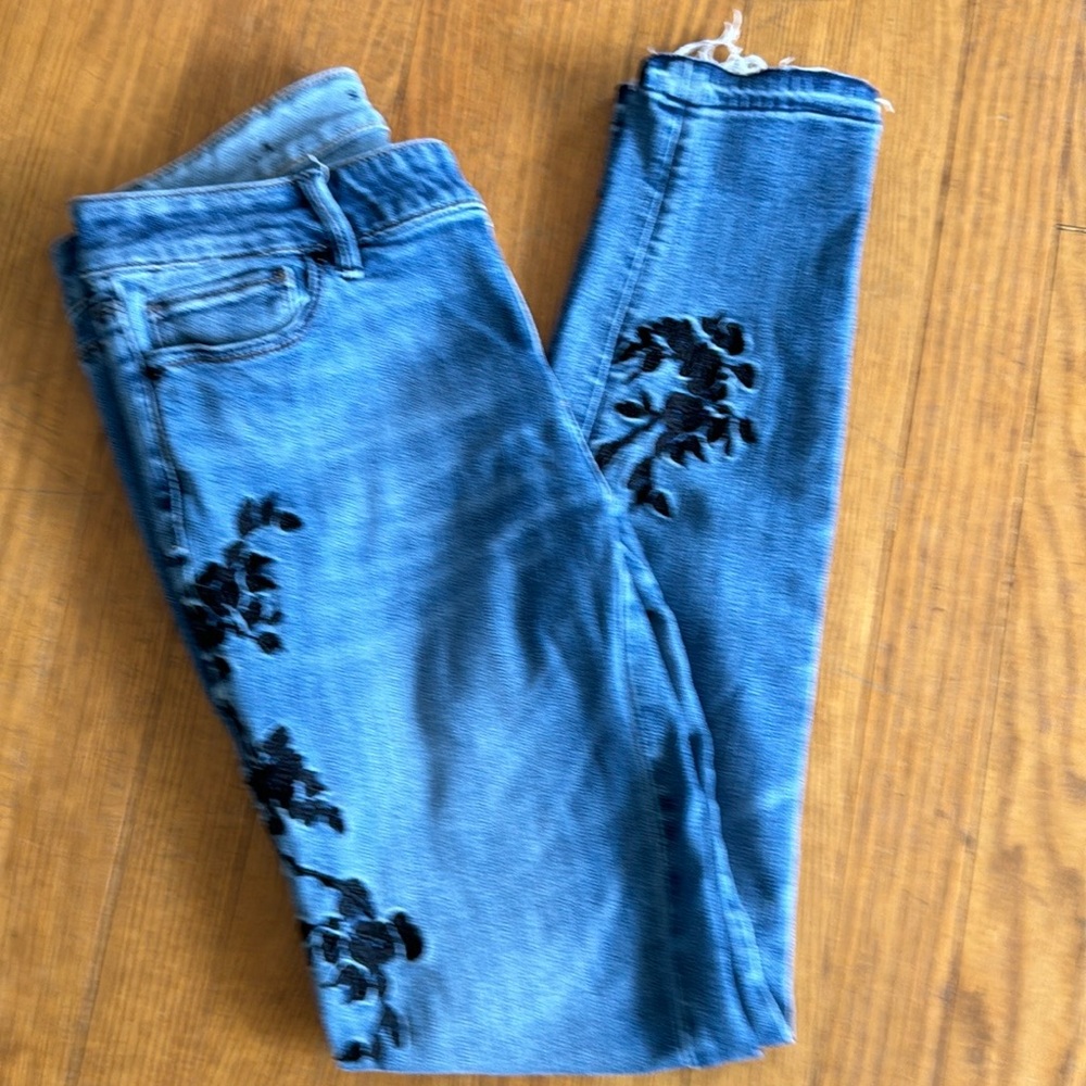 White House Black Market Blue Skinny Jeans with Black Floral Design